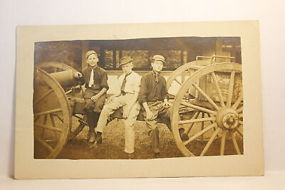 #ad Postcard RPPC Children Siting On Cannons S24 $6.79