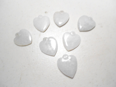 #ad 7cs.loose pure white heart pendants $157.50