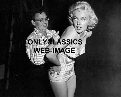 #ad 1949 SEXY HOT MARILYN MONROE PUTTING ON SWIMSUIT CANDID PHOTO CHEESECAKE PINUP $14.41
