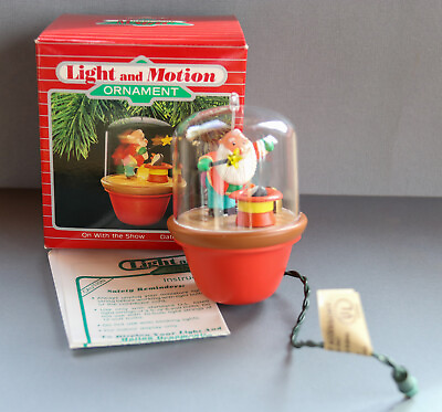#ad 1988 Hallmark Light and Motion Ornament On With The Show In Box $25.00