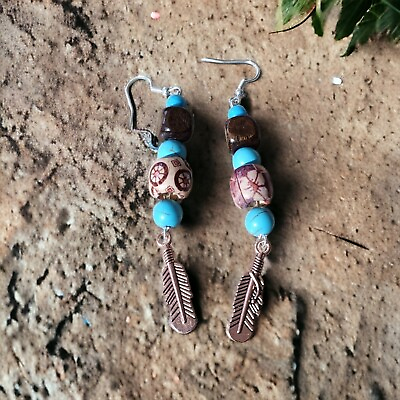 #ad Earrings: Feather Up $20.00