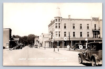 #ad J90 New London Wisconsin RPPC Postcard c40 50s Water St Stores Hotel 501 $13.80