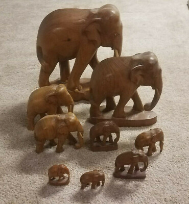 #ad wooden elephant figurines multiple sizes $30.00