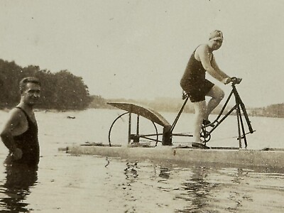 #ad 1N Photograph 1920#x27;s Woman Riding Floating Bike Bicycle Water Lake *Torn* $14.97