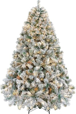 #ad 6 FT CHRISTMAS TREE. PRELIT FAKE SNOW PERFECT CONDITION. $100.00